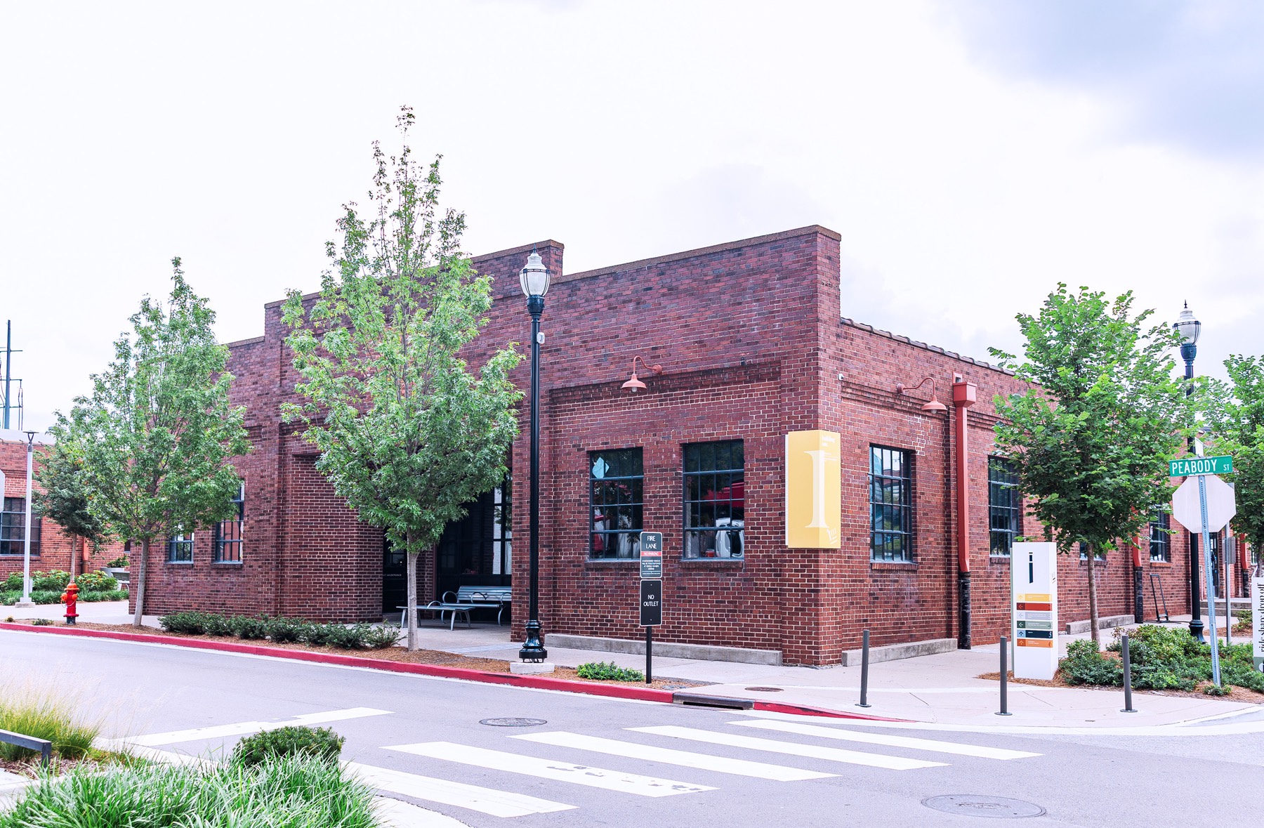 The Nashville Entrepreneur Center, a red brick building on the corner of Peabody Street.